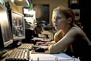 Maya (Jessica Chastain), baggy-eyed as she watches countless interrogations of detainees in her attempts to find a lead to Osama Bin Laden's location.