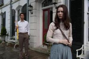 Charlie (Matthew Goode) watching look like a stalker as his niece, India (Mia Wasikowska), walks to school.