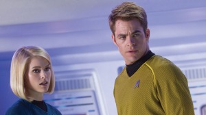 Captain James Kirk (Chris Pine) mulling over whether it would be a good idea to take Dr. Carol Marcus (Alice Eve) on board. 