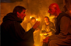 Moses (Christian Bale) speaking with Nun (Ben Kingsley), one of the enslaved leaders of the Jewish tribes in Piton, about the need to escape Egypt.