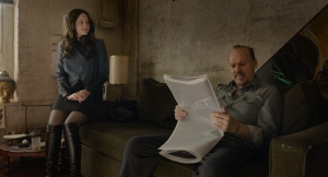 Riggan reading criticism of the production and ignoring the attentions of his sort of girlfriend, Laura (Andrea Riseborough), much to her angst.